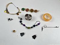 Flat lay of all nine jewellery pieces