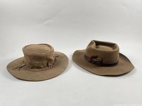 Both hats side by side showing overall style and materials