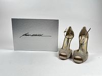 Overall view of heels with original box