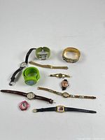 Group shot of all watches and Seiko band