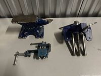 Overview showing anvil and two clamps