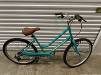 Full side view of teal Supercycle Pathway bicycle