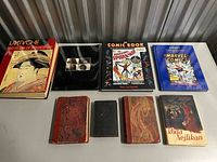 Group shot displaying all nine books