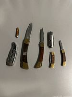 Overview of six items laid out on surface