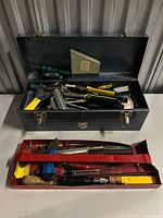 Overall view of Beach toolbox with open lid showing tools and red tray beneath