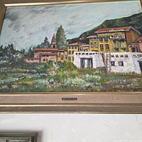 Frontal view of framed painting showing artwork and frame