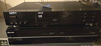 Front view of both APEX DVD player and Toshiba DVD/VCR combo