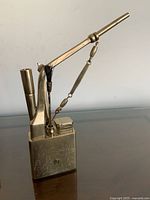 Full pipe setup showing mouthpiece, base, hanging tools and brush