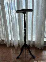 Full view of wood plant stand showing tripod base and overall height