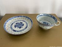 Cup and matching plate showing overall design