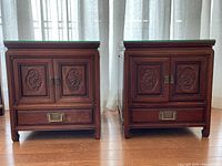 Front view of both matching side tables showing design and condition