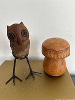 Front view of driftwood owl and wood mushroom container