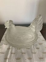 Full view of frosted glass hen on nest covered bowl assembled