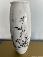 front view showing painted Chinese landscape and calligraphy on white-grey marble vase