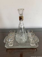 Full set showing decanter, six glasses on tray