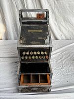 Front view showing key buttons, wood drawer and No Sale flag