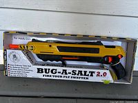 Front view of boxed Bug-A-Salt 2.0 salt gun
