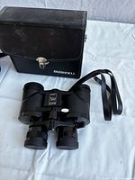 Binocular front view with rectangular Bushnell case