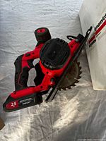 Left side view showing body, battery pack and blade