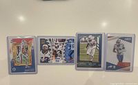 Four Gabriel Davis rookie cards in sleeves displayed side by side