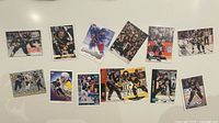 All 13 Jaromir Jagr hockey cards laid out on flat surface
