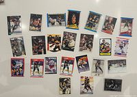 Group image showing all Mario Lemieux cards laid out in three rows on white surface