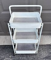 front view of white 3-tier rolling cart