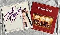 Front covers of both soundtrack LPs