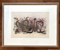 full view of framed lithograph with mat and frame