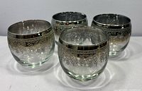 Four roly poly glasses front angle