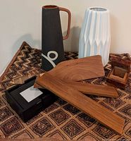 Group shot of all items in lot on patterned textile