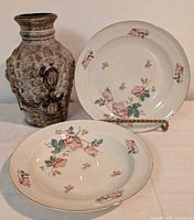 Group shot showing Carstens vase, Thomas dinner plate and soup bowl