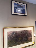 Overall view of both framed prints on wall
