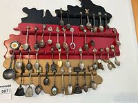 Full view of Germany-shaped rack with all souvenir spoons displayed