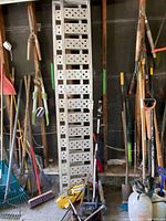 Pair of Prime aluminum ramps, other automotive items at base