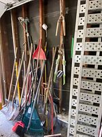 overall view of garden tools and aluminum ramp