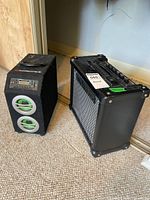 Roland Cube-10GX amp beside Sondpex speaker
