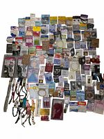 Entire spread of assorted packaged jewelry supplies