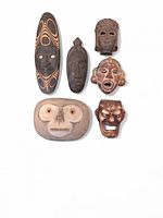 All six masks arranged together for scale and comparison