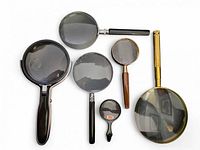 Six handheld magnifying glasses