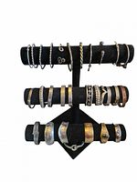 Full view of three-tier stand showing entire assortment of bracelets