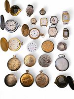 Overview of assorted pocket watches, cases, loose dials and watch heads