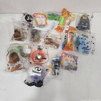 All sealed Happy Meal toys laid out for overview