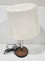 Full view of lamp showing shade, stem, base and cord