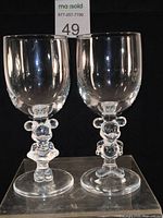 Front view showing both Mickey and Minnie stem wine glasses