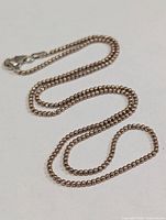 Full view of silver bead chain laid out