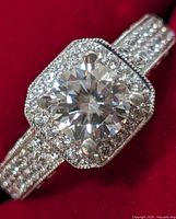 Top view showing moissanite center and CZ halo