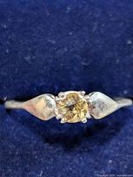 Ring top view showing citrine and prongs