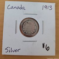 Reverse of 1913 Canada 5¢ coin in flip