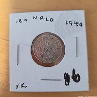 Reverse of 1944 Newfoundland 10¢ coin in holder